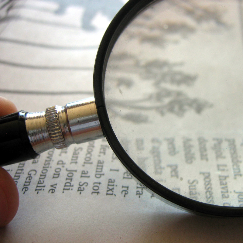 Magnifying Glass on a Book-1 Cropped